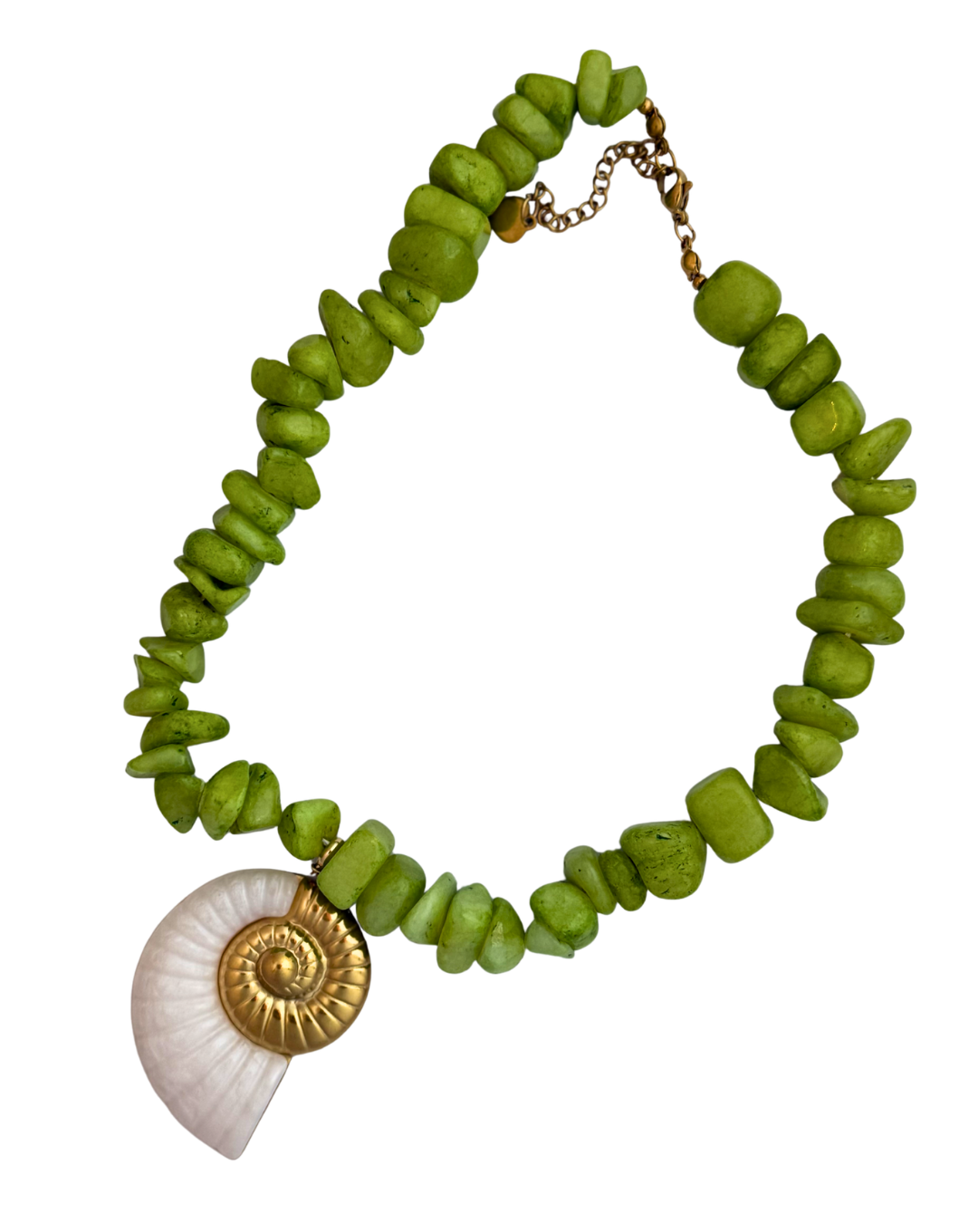 Seagrass Cowgirl Necklace by From Juniper With Love; green bead strand with a white shell and gold spiral pendant.