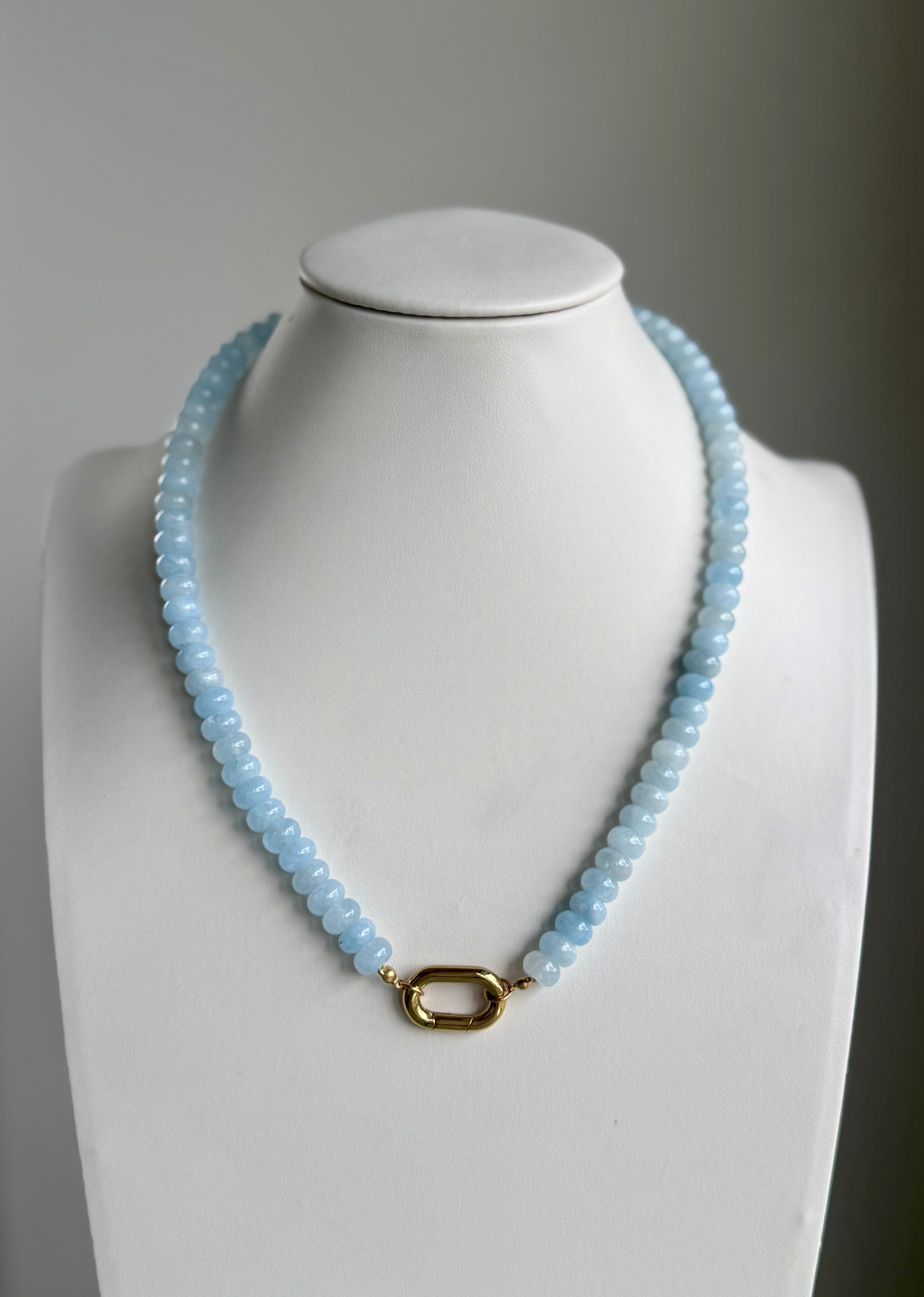 Keepsake Strand Necklace / Coastal Mist featuring pale blue beads and a gold-tone clasp.