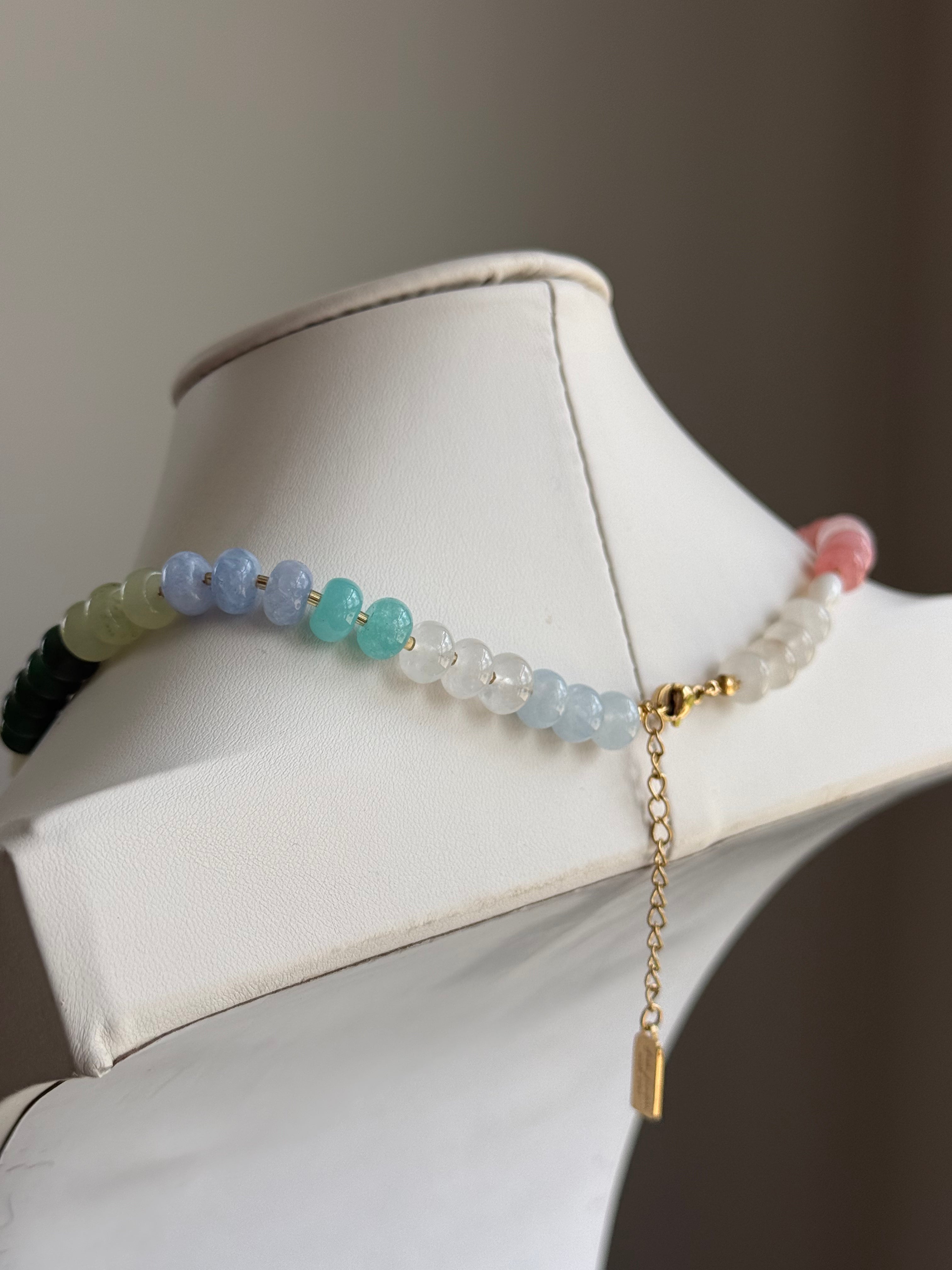 Keepsake Strand Necklace with pastel gemstone beads on a delicate gold chain.