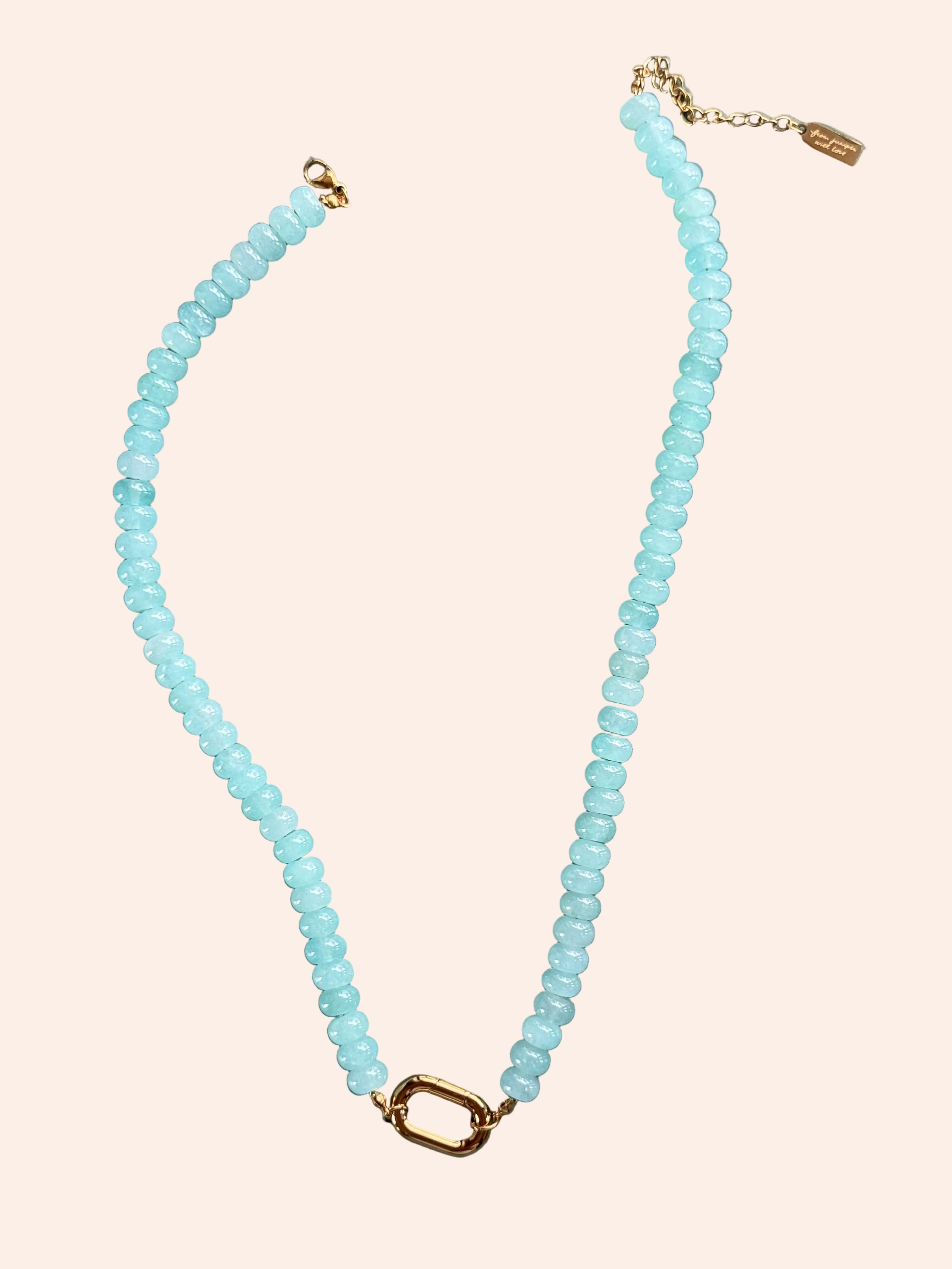 Keepsake Strand Necklace with sea glass blue beads on a gold-tone chain; From Juniper With Love.