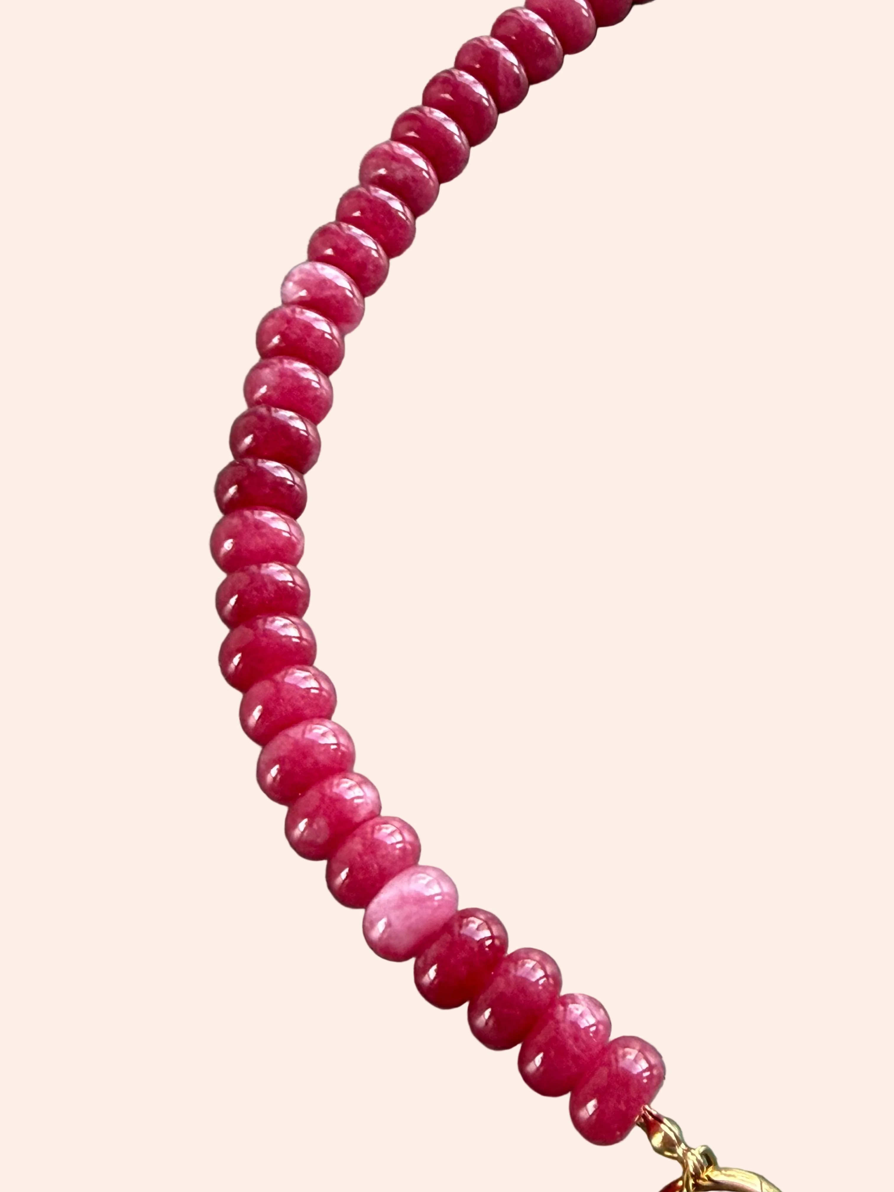 Keepsake Strand Necklace with pink strawberry beads and a gold clasp