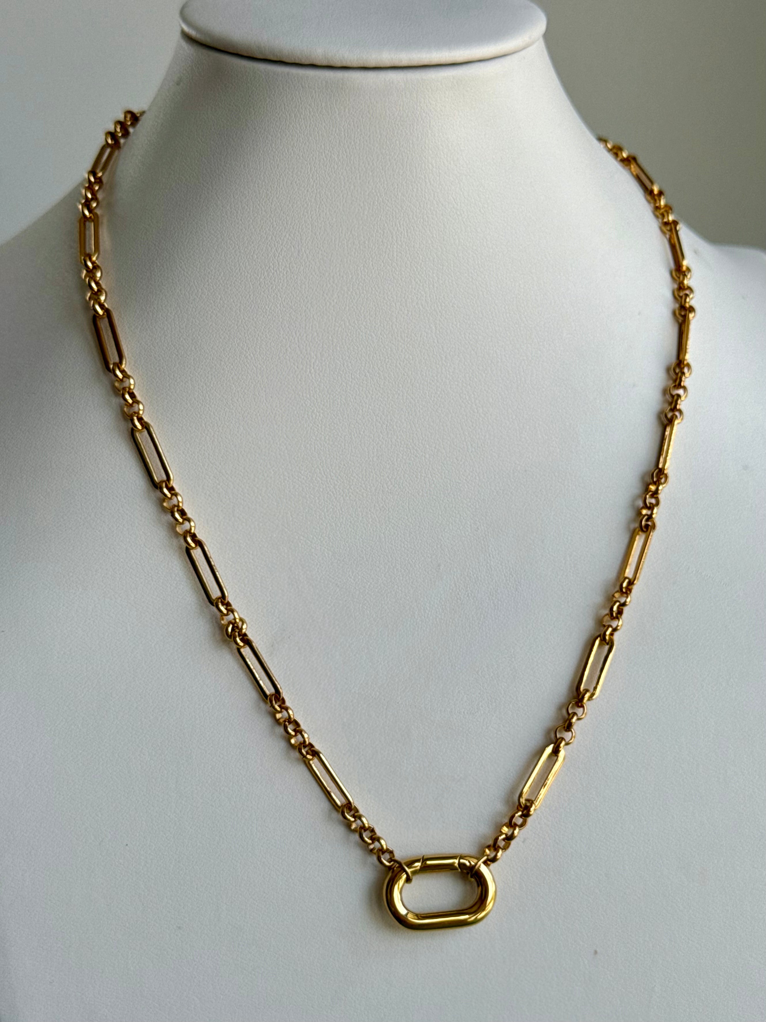 Signature Chain necklace in gold with slim rectangular links and a large oval pendant