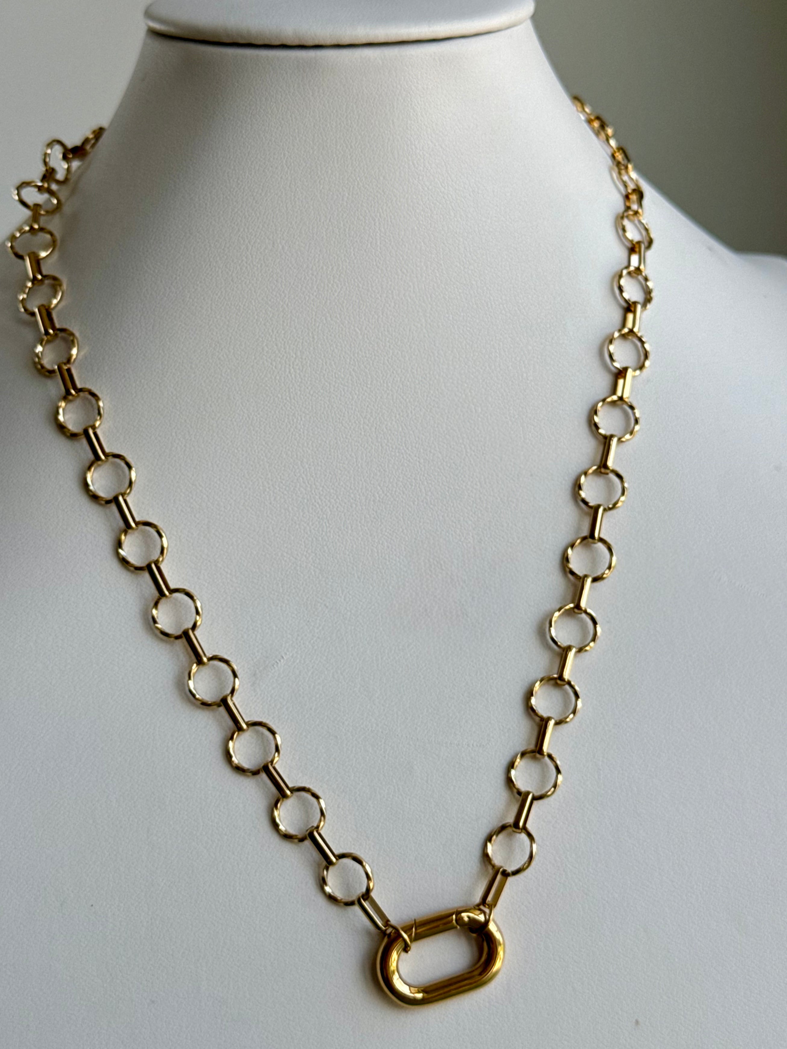 Signature Chain / Classic Loop necklace by From Juniper With Love, gold-tone circular-link chain on a display bust
