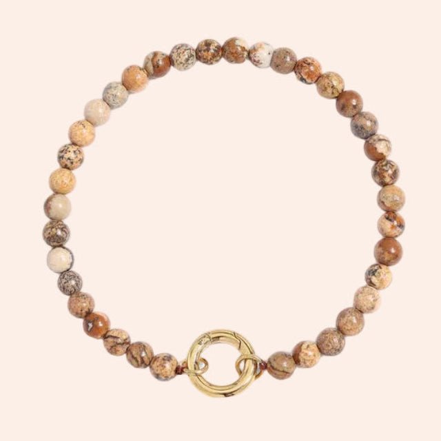 Charm Holder Bracelet with tan speckled stone beads and a gold-tone ring clasp