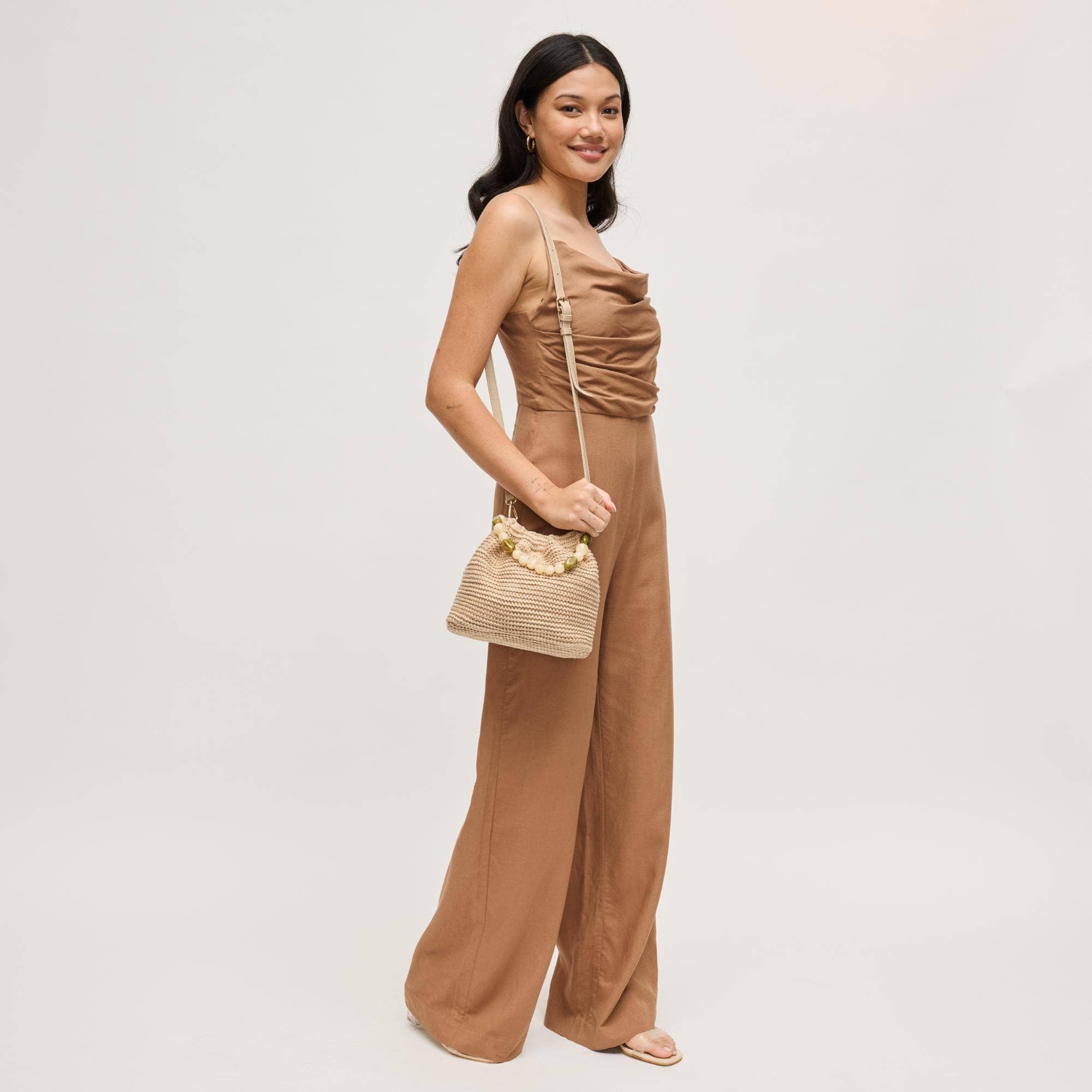 Emery Crossbody bag in natural woven straw with beige strap
