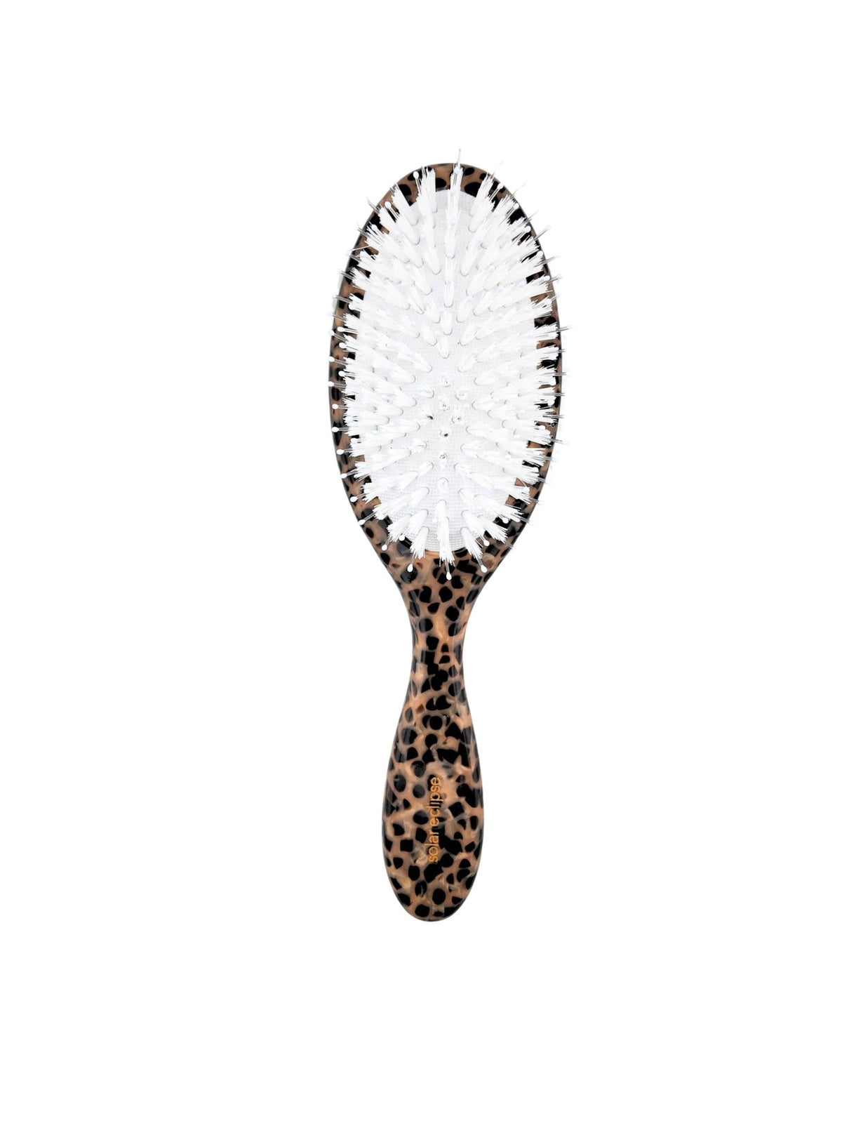 Hand-painted leopard bow brush by Solar Eclipse with leopard-print handle and white bristles