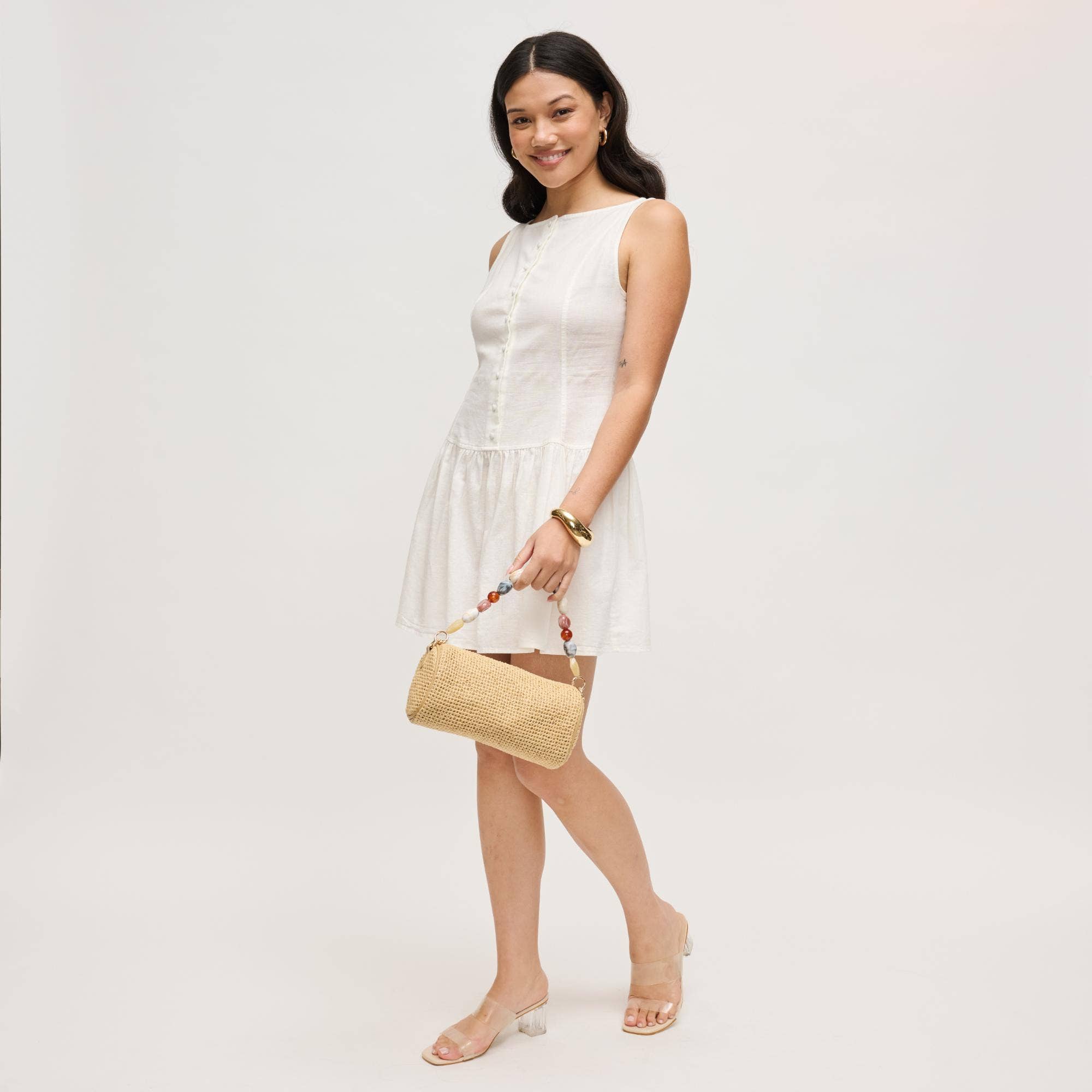 Rachel straw clutch by Urban Expressions in natural woven straw with beaded strap.