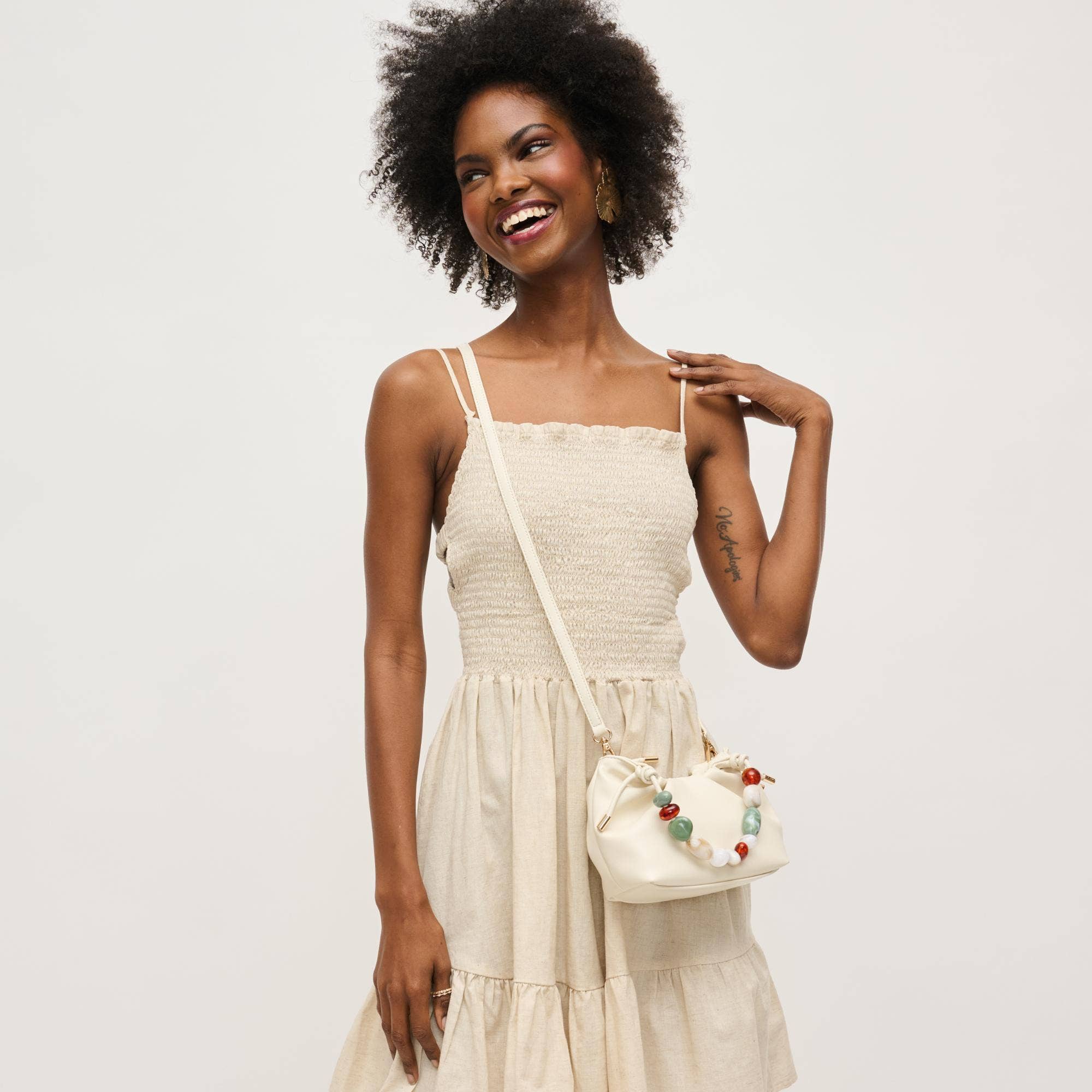 Yzabelle Crossbody Ivory by Urban Expressions with a colorful beaded strap