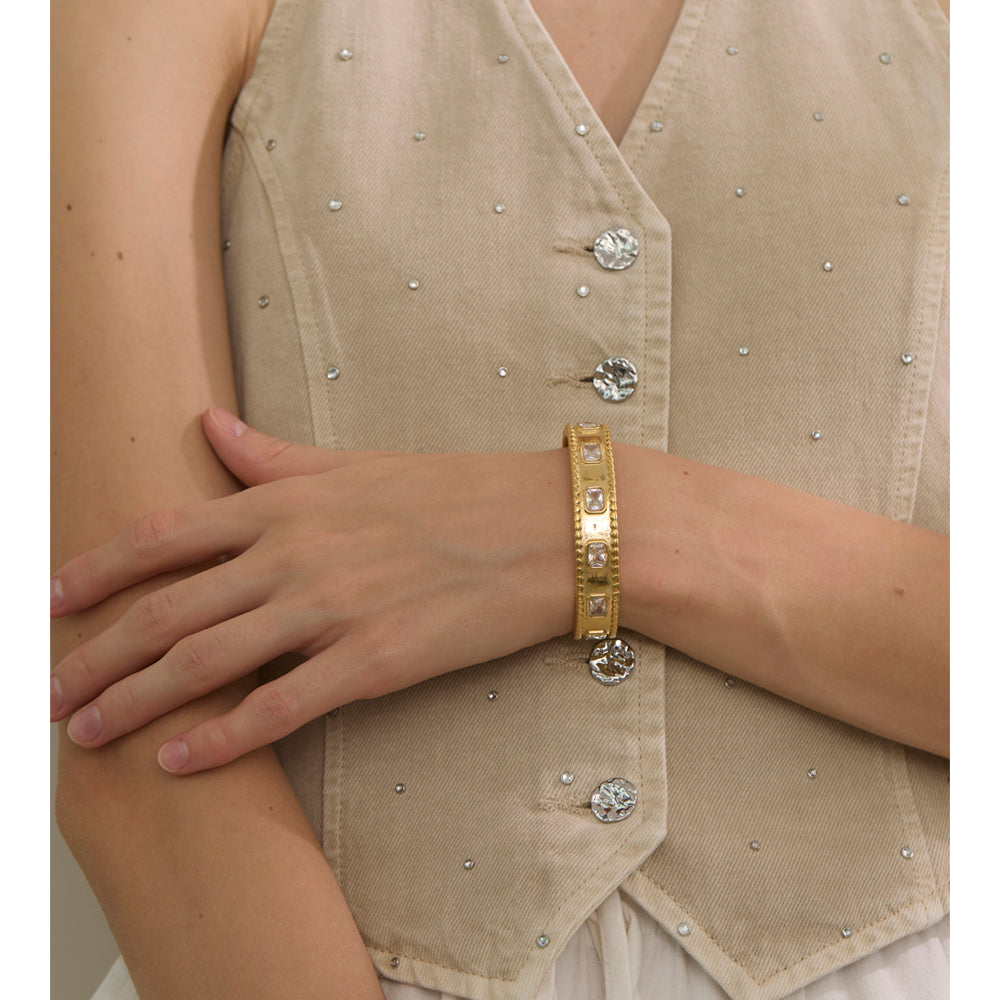 Golden Story Cuff bracelet by From Juniper With Love; gold-tone band with square-cut stones