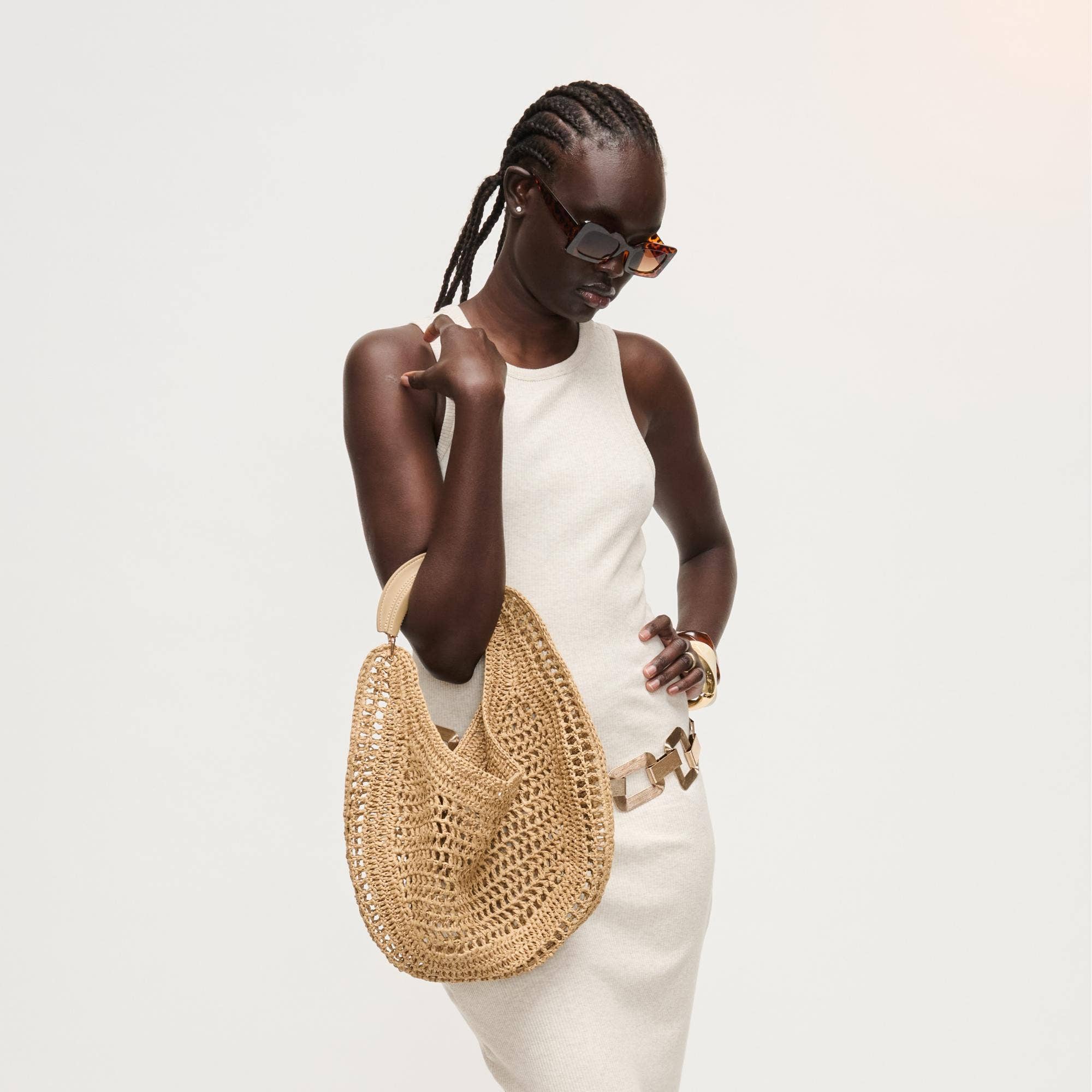 Camden Hobo bag in natural straw with tan leather handles.