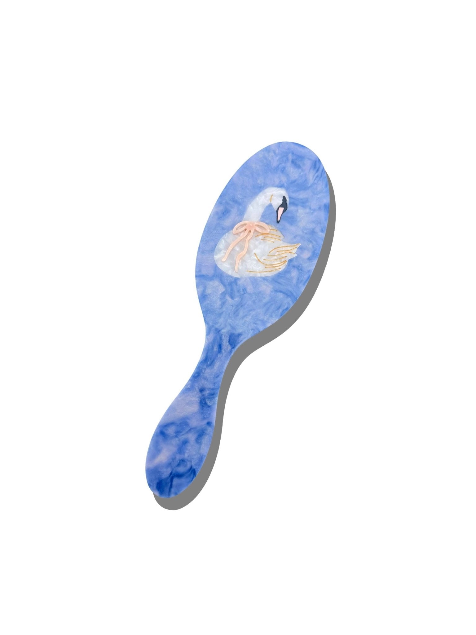 Solar Eclipse hand-painted bow swan hair brush with a blue marbled handle