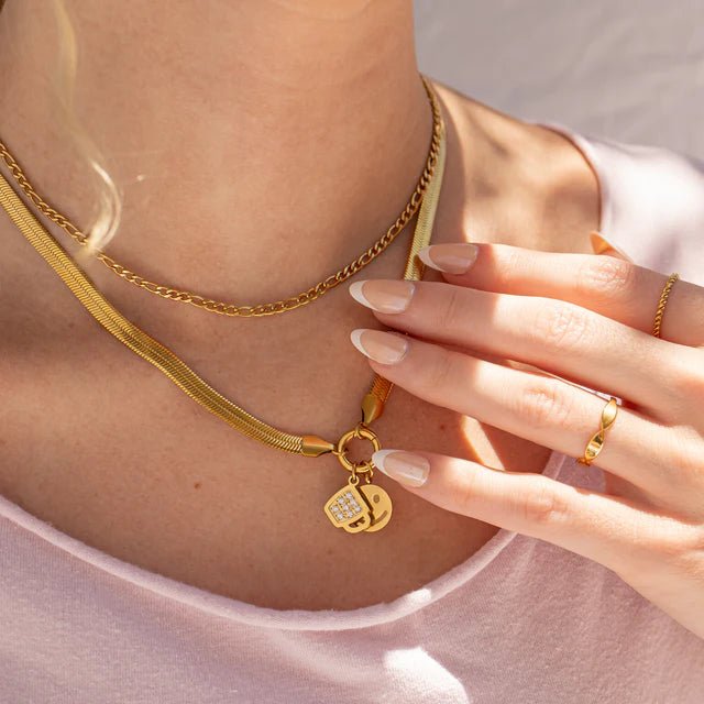 Herringbone Charm Holder Necklace set in gold by From Juniper With Love; two-layer gold necklaces with heart charm
